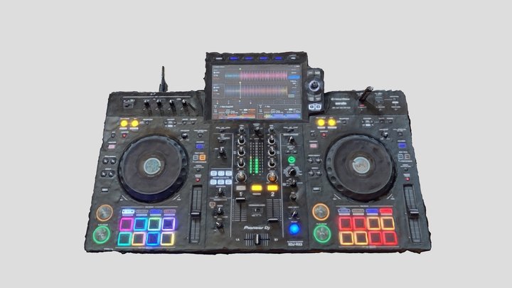 XDJ-RX3 vista desde arriba, con pantalla, dos decks, mixer central y pads visibles.